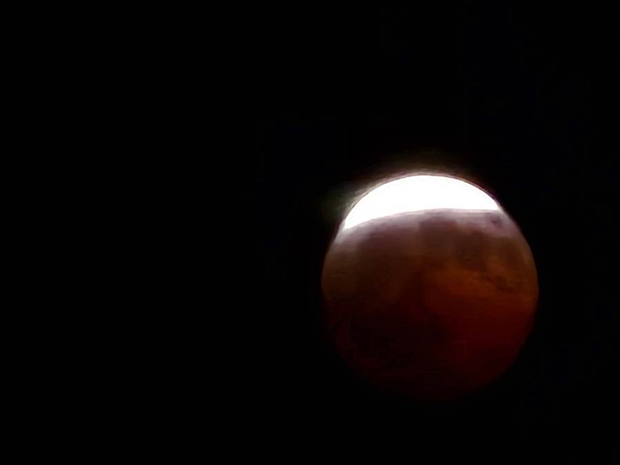 The Moon glowing red during the total lunar eclipse